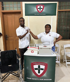 SIIG representatives at a community safety event stand